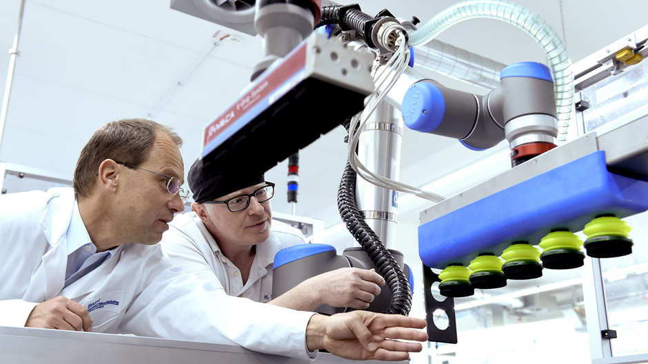 Christoph Hausser and machine operator Heiko Westphal