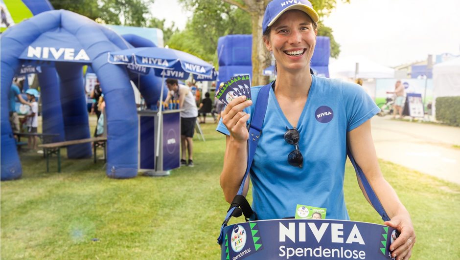 Woman selling prize-draw tickets