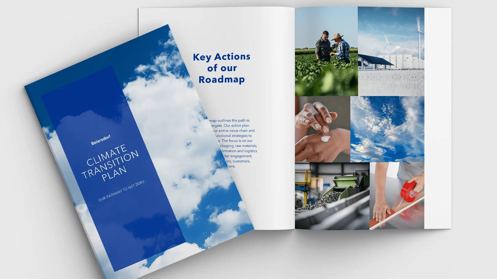 Open book with the title climate transition plan on grey background.