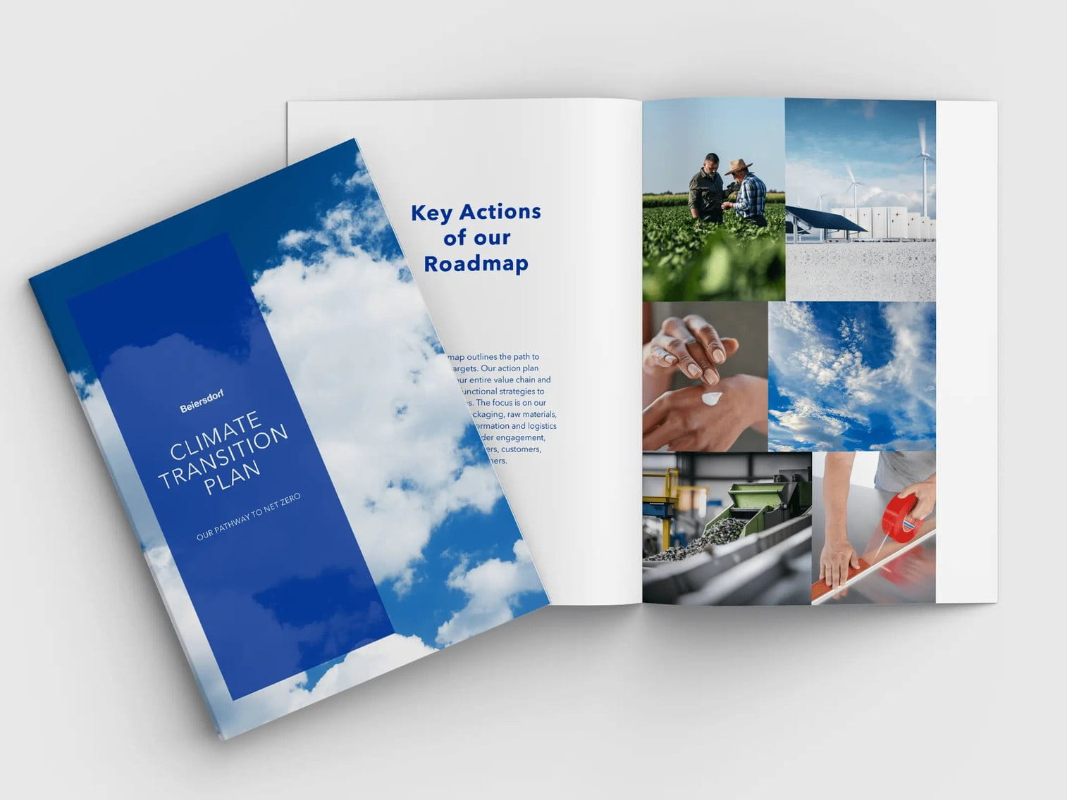 Open book with the title climate transition plan on grey background.