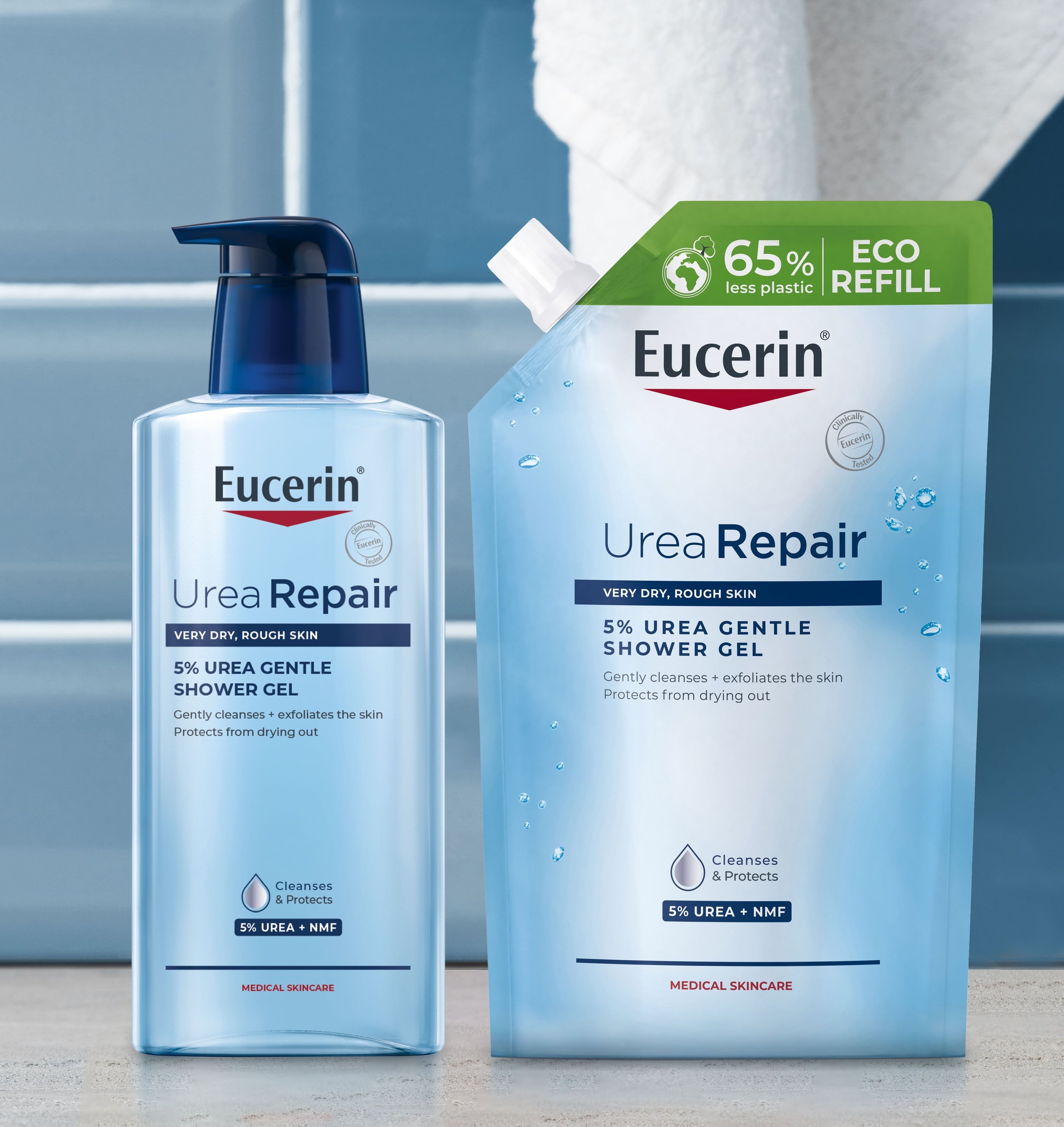 “Eucerin UreaRepair 5% Urea Gentle Shower Gel shown in a pump bottle alongside an eco-refill pouch, displayed in a clean bathroom setting, highlighting reduced plastic packaging.