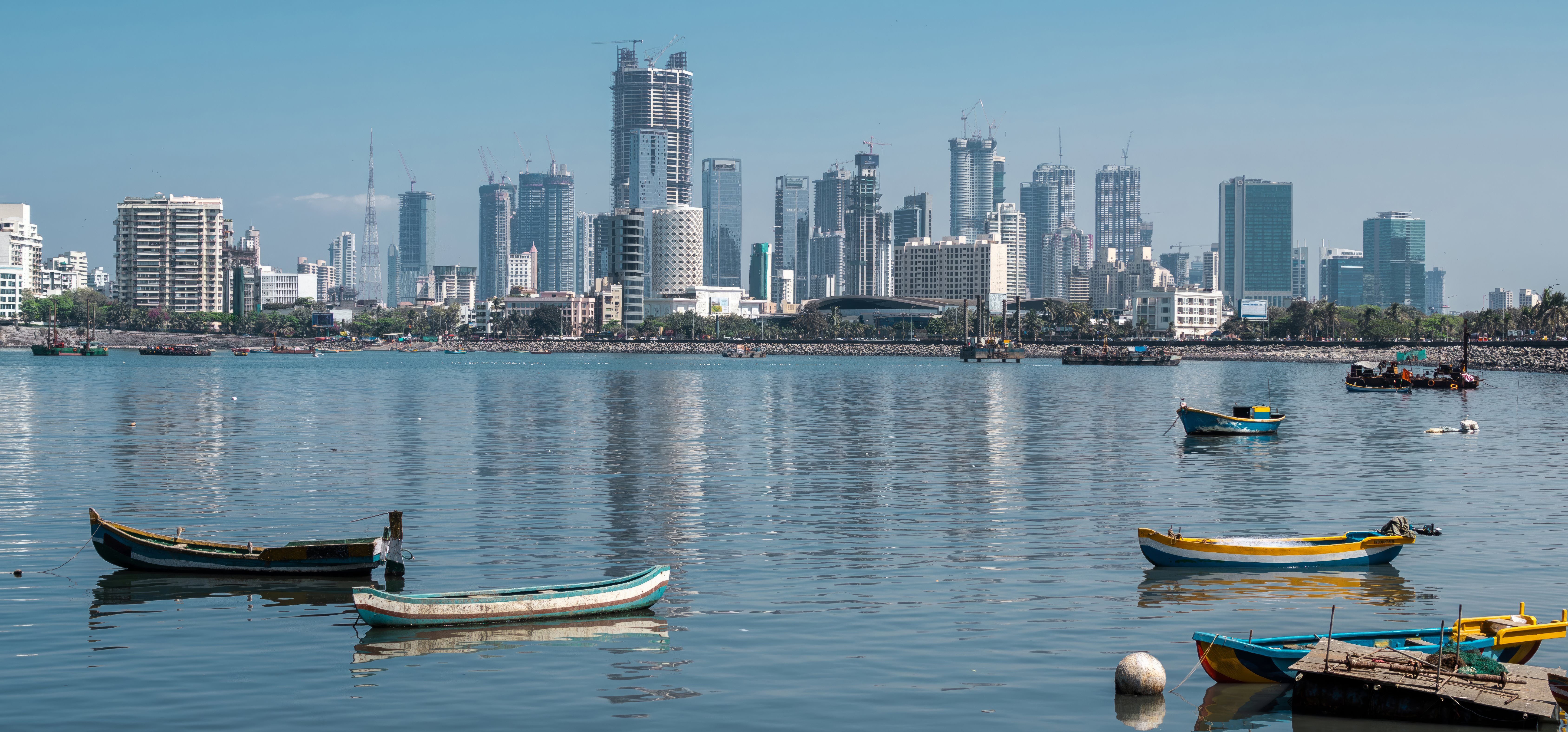 outdoor, water, lake, sky, transport, vehicle, watercraft, boating, ship, building, skyscraper, waterway, canoe, boat, skyline, water transportation, city