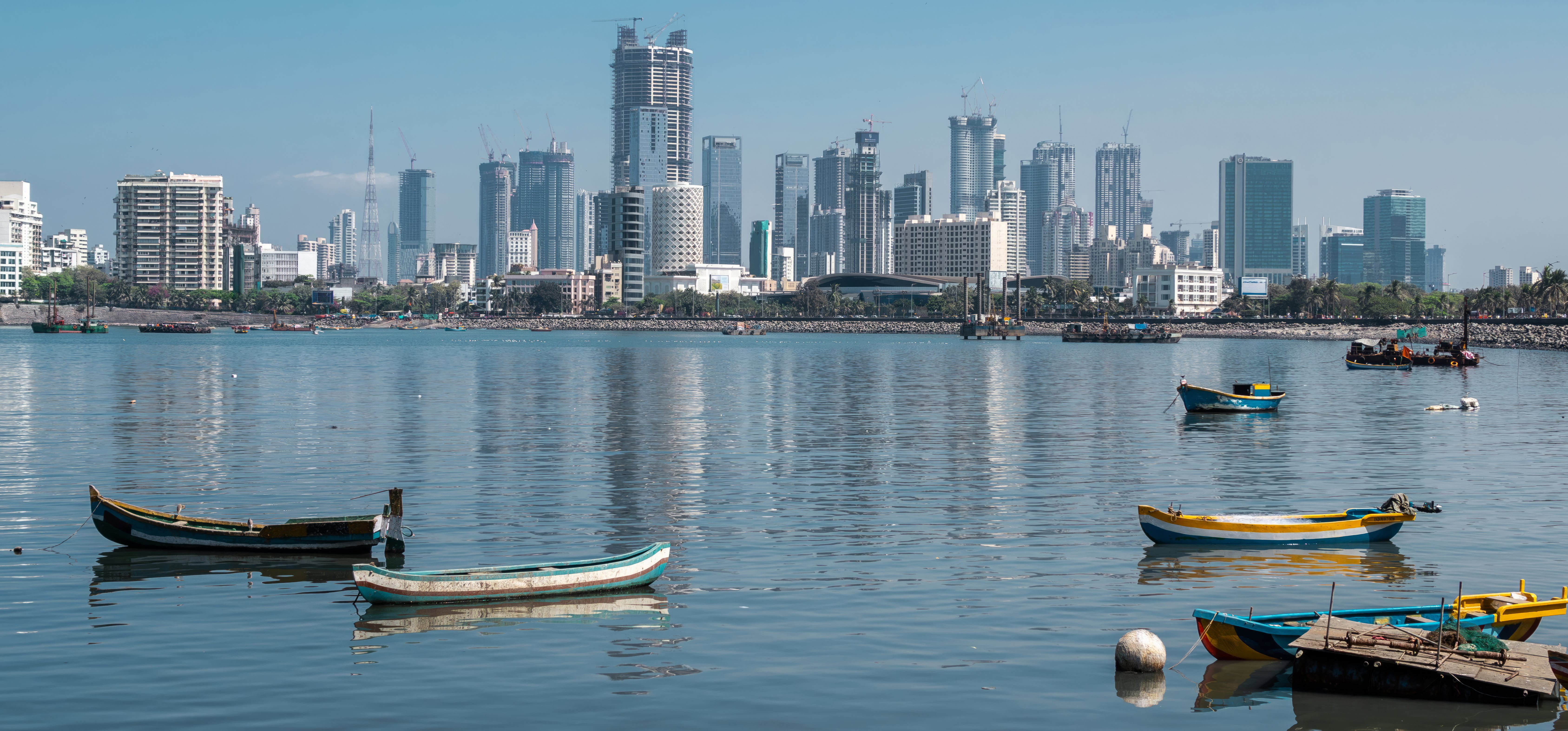 outdoor, water, lake, sky, transport, vehicle, watercraft, boating, ship, building, skyscraper, waterway, canoe, boat, skyline, water transportation, city