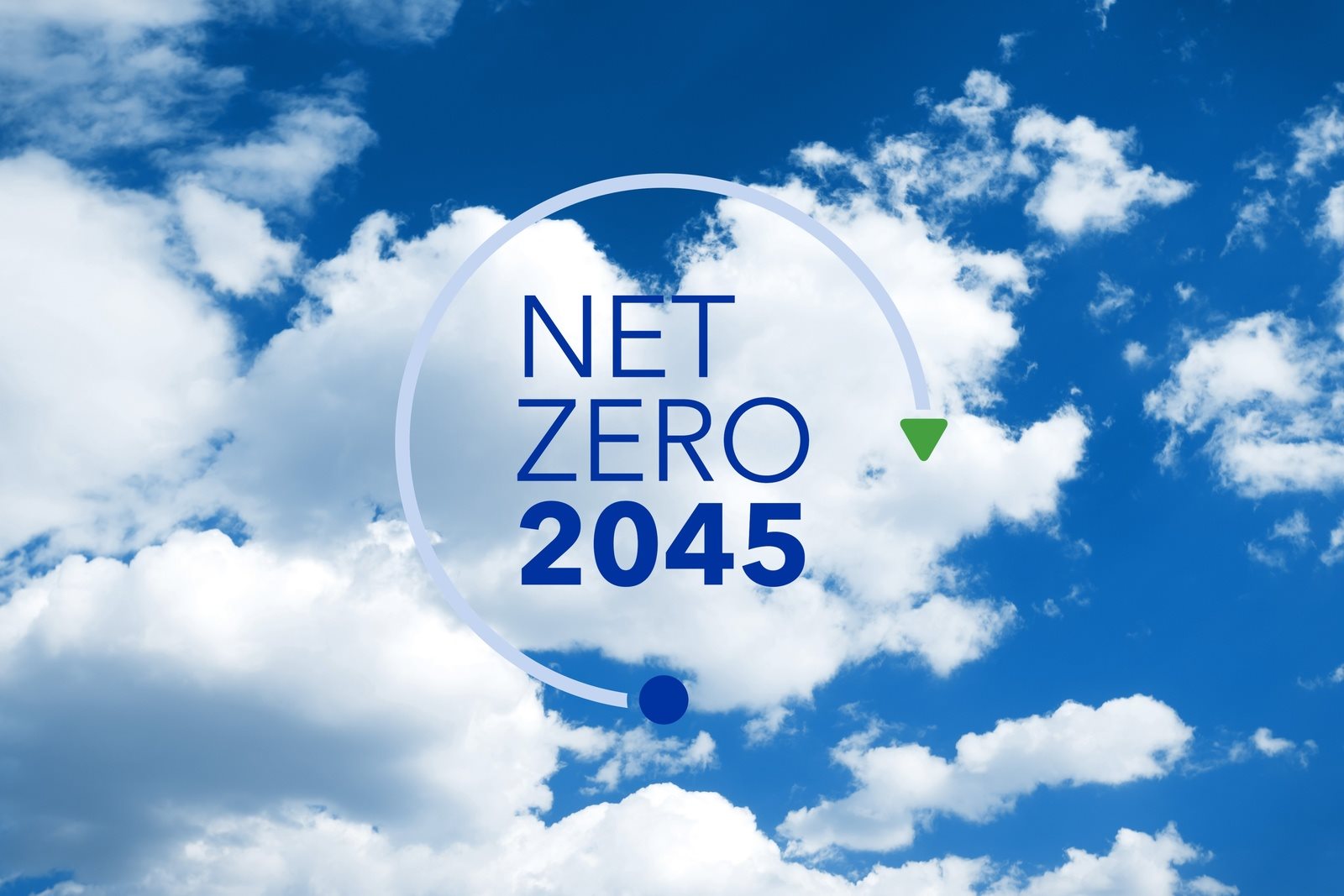 Blue sky with Net Zero logo in the forefront