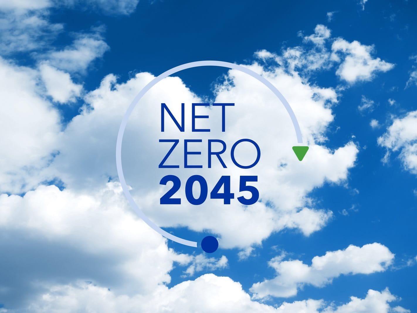 Blue sky with Net Zero logo in the forefront