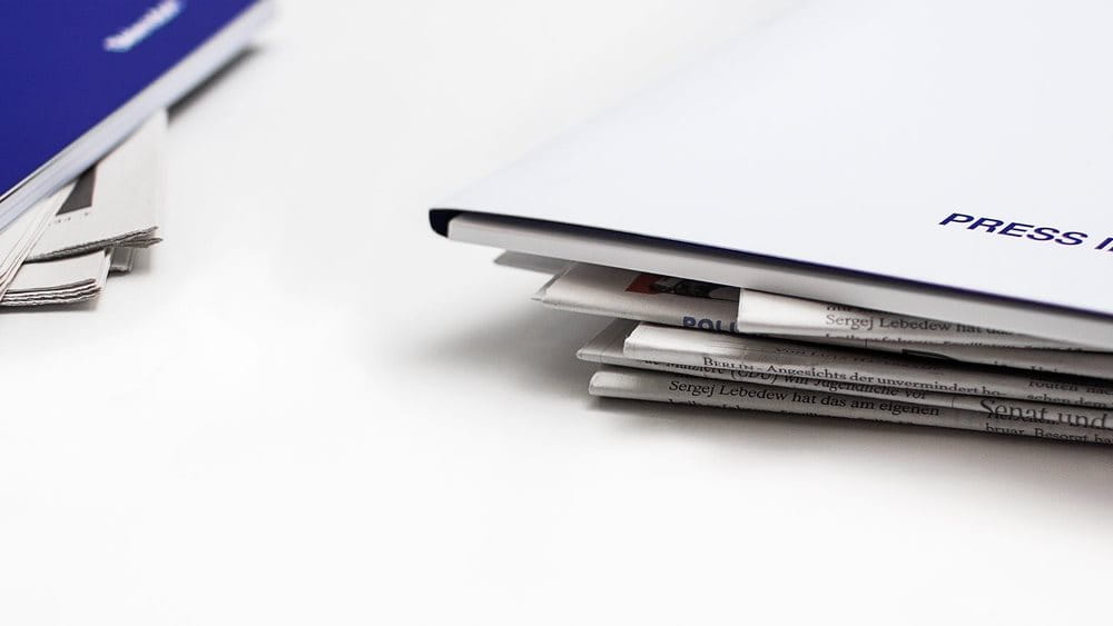 Press information folder on a table